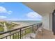Enjoy beautiful ocean views from this spacious balcony complete with comfortable seating at 201 77Th Ave. N # 1133, Myrtle Beach, SC 29572