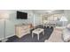 Cozy living room with an open floor plan, balcony view, and dining area at 201 77Th Ave. N # 1133, Myrtle Beach, SC 29572