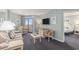 Living room featuring comfortable seating, balcony access, and a view of the ocean at 201 77Th Ave. N # 1133, Myrtle Beach, SC 29572