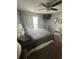 Cozy bedroom with a ceiling fan, TV, neutral colors, and balcony access at 201 Hillside Dr. N # 111, North Myrtle Beach, SC 29582