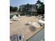 Lounge on the deck with chairs, tables, and gazebo overlooking a pond with fountains at 201 Hillside Dr. N # 111, North Myrtle Beach, SC 29582
