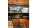 Kitchen sink area with an open view to the dining and living rooms at 201 Hillside Dr. N # 111, North Myrtle Beach, SC 29582