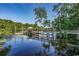 Beautiful view of the community dock, accessible by a charming wooden walkway and surrounded by lush greenery at 204 Rose Water Loop # 204, Myrtle Beach, SC 29588