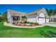 Charming single-story home with a well-manicured lawn, mature landscaping, and a two-car garage at 204 Rose Water Loop # 204, Myrtle Beach, SC 29588