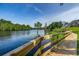 Picturesque lakeside boardwalk offering scenic views and a peaceful retreat for residents to enjoy nature's tranquility at 204 Rose Water Loop # 204, Myrtle Beach, SC 29588