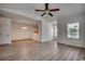Bright and airy living room boasting a ceiling fan and laminate flooring, and neutral walls at 204 Rose Water Loop # 204, Myrtle Beach, SC 29588