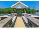 A tranquil view inside the pier pavilion featuring benches and waterfront scenery, a perfect spot to relax at 204 Rose Water Loop # 204, Myrtle Beach, SC 29588