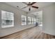 Inviting sun room featuring an abundance of natural light, laminate flooring and a ceiling fan at 204 Rose Water Loop # 204, Myrtle Beach, SC 29588