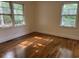 Bright bedroom with hardwood floors and large windows at 205 S Oliver Blvd., Hemingway, SC 29554