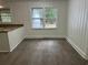 Bright kitchen nook bathed in natural light, perfect for casual dining at 205 S Oliver Blvd., Hemingway, SC 29554