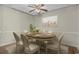 Elegant dining room with decorative ceiling fan and views to the living spaces at 2241 Waterview Dr. # 514, North Myrtle Beach, SC 29582