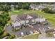 A well-maintained condo building with a parking area and golf course view at 2241 Waterview Dr. # 514, North Myrtle Beach, SC 29582