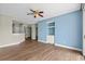 Living room with built-in shelving and a view into the kitchen through an arched opening at 2241 Waterview Dr. # 514, North Myrtle Beach, SC 29582