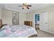 Comfortable main bedroom features neutral walls and an entryway to the main bathroom at 2241 Waterview Dr. # 514, North Myrtle Beach, SC 29582