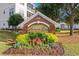Elegant Harbour Cove community sign surrounded by vibrant flowers and manicured landscaping at 2241 Waterview Dr. # 514, North Myrtle Beach, SC 29582