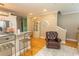 Comfortable living room featuring hardwood floors, bar seating, and stylish decor at 2428 Little River Neck Rd. # 101, North Myrtle Beach, SC 29582