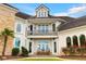 This stately home features a second story balcony and immaculate landscaping at 2715 Ships Wheel Dr., North Myrtle Beach, SC 29582