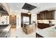 Spacious kitchen featuring custom cabinetry, stainless steel appliances, and granite countertops at 2715 Ships Wheel Dr., North Myrtle Beach, SC 29582