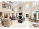 Spacious living room with fireplace, high ceilings, and elegant decor at 2715 Ships Wheel Dr., North Myrtle Beach, SC 29582