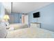 Inviting bedroom with two queen beds, a dresser, and an open closet at 2801 S Ocean Blvd. # 835, North Myrtle Beach, SC 29582