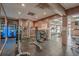 Gym with weight machines, free weights, water cooler, and fitness rules posted on the wall at 2801 S Ocean Blvd. # 835, North Myrtle Beach, SC 29582