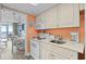 Kitchen area that opens into the living area with appliances at 2801 S Ocean Blvd. # 835, North Myrtle Beach, SC 29582