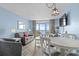 Comfortable living area with ocean view balcony, featuring a dining table and chairs at 2801 S Ocean Blvd. # 835, North Myrtle Beach, SC 29582