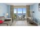 Relaxing living room offering ocean views and access to a private balcony at 2801 S Ocean Blvd. # 835, North Myrtle Beach, SC 29582