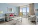Inviting living room area with balcony access, features cozy seating and ocean views at 2801 S Ocean Blvd. # 835, North Myrtle Beach, SC 29582