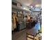 Boutique displaying clothing racks, artwork, and display cases filled with unique treasures at 2834 Howard Ave. # D, Myrtle Beach, SC 29577