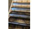Unique staircase featuring custom painted designs on the treads, adding charm to the home at 2834 Howard Ave. # D, Myrtle Beach, SC 29577