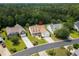 An aerial view of a single Gathering home with a well-manicured lawn at 29 Saltwind Loop, Murrells Inlet, SC 29576
