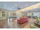 Spacious clubhouse with tables, chairs, sofas, a billiard table, and views of the exterior at 29 Saltwind Loop, Murrells Inlet, SC 29576