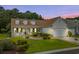 Charming single-story home with a well-manicured lawn and an attached garage at 29 Saltwind Loop, Murrells Inlet, SC 29576