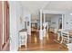 Inviting foyer with gleaming hardwood floors and views into the dining and living spaces at 29 Saltwind Loop, Murrells Inlet, SC 29576