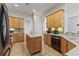 Spacious kitchen featuring an island, tiled backsplash, and stainless steel appliances at 29 Saltwind Loop, Murrells Inlet, SC 29576