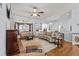 Cozy living room with hardwood floors, elegant furnishings, and ample natural light at 29 Saltwind Loop, Murrells Inlet, SC 29576