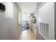 Hallway view leading to a dining area with ocean view windows at 300 N Ocean Blvd. # 723, North Myrtle Beach, SC 29582