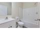 Clean bathroom with tub and shower combo, toilet, sink, and vanity at 306 S Magnolia Ave., Andrews, SC 29510