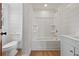 Bathroom features white shiplap, updated vanity, shower and toilet at 3202 Inland St., North Myrtle Beach, SC 29582