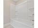Bright white bathtub with built-in shelving and chrome faucet hardware at 3202 Inland St., North Myrtle Beach, SC 29582