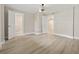 Spacious bedroom features wood-look flooring and multiple access doors at 3202 Inland St., North Myrtle Beach, SC 29582