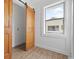 Small bedroom features barn door closet and horizontal shiplap at 3202 Inland St., North Myrtle Beach, SC 29582