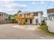 Coastal home featuring a spacious parking area, outdoor stairs, and a second-story balcony at 3202 Inland St., North Myrtle Beach, SC 29582