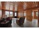 Inviting living room featuring wood paneling and a view of the outside at 3202 Inland St., North Myrtle Beach, SC 29582