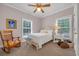 Bright bedroom with natural light, a ceiling fan, and cozy furniture at 3231 Center Rd., Georgetown, SC 29440