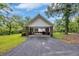 Spacious brick carport with a golf cart and plenty of room for entertaining at 3231 Center Rd., Georgetown, SC 29440