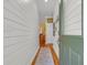 Bright foyer featuring hardwood floors, shiplap walls, and views into the living room at 3231 Center Rd., Georgetown, SC 29440