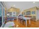 Open living space with high ceilings, hardwood floors, and staircase leading to upper level at 3231 Center Rd., Georgetown, SC 29440