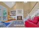 Comfortable living room with built-in shelving, a fireplace, and plenty of natural light at 3231 Center Rd., Georgetown, SC 29440